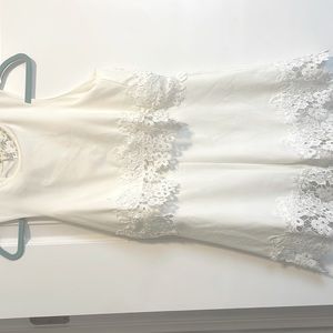 white romper with laced back!